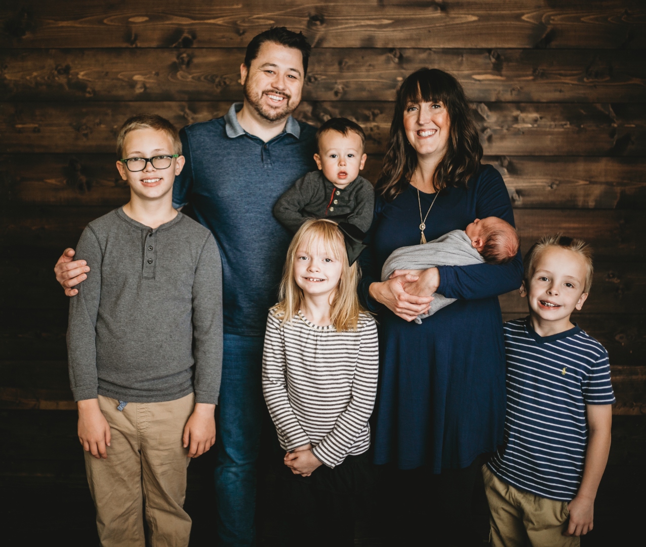 Micah Beebe with his wife April and their five children